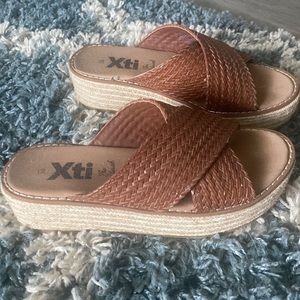 Brown platform braided sandals
